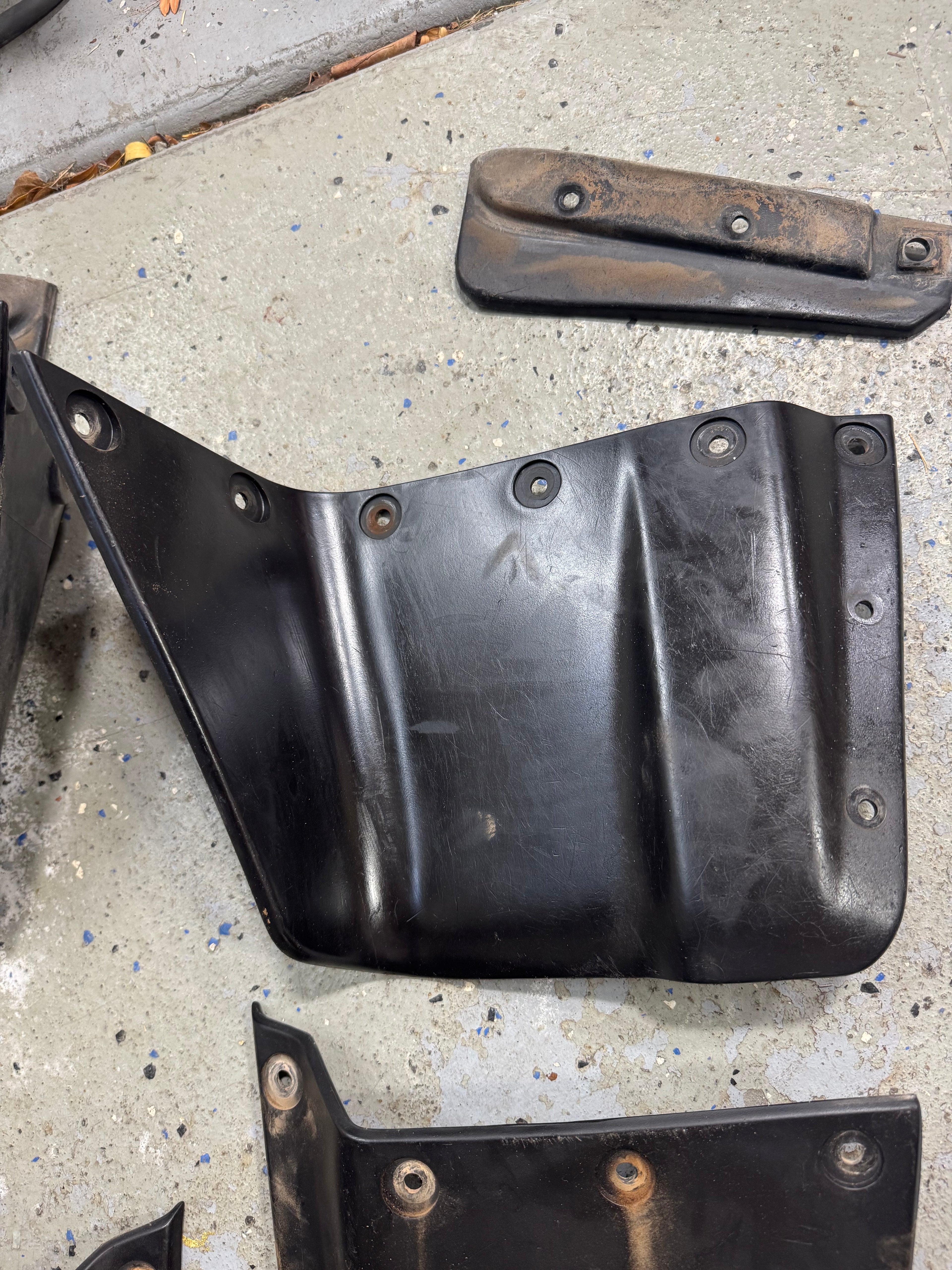 1989-2005 OEM Used Kawasaki Bayou 4x4 Mud Flaps Fender Plastics